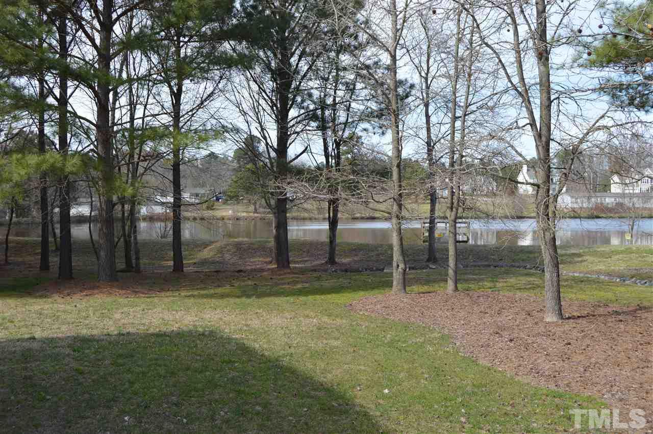 1069 Wheeler Pond Road Creedmoor, NC 27522 - Photo 17 of 22 a view of outdoor space with deck and tree