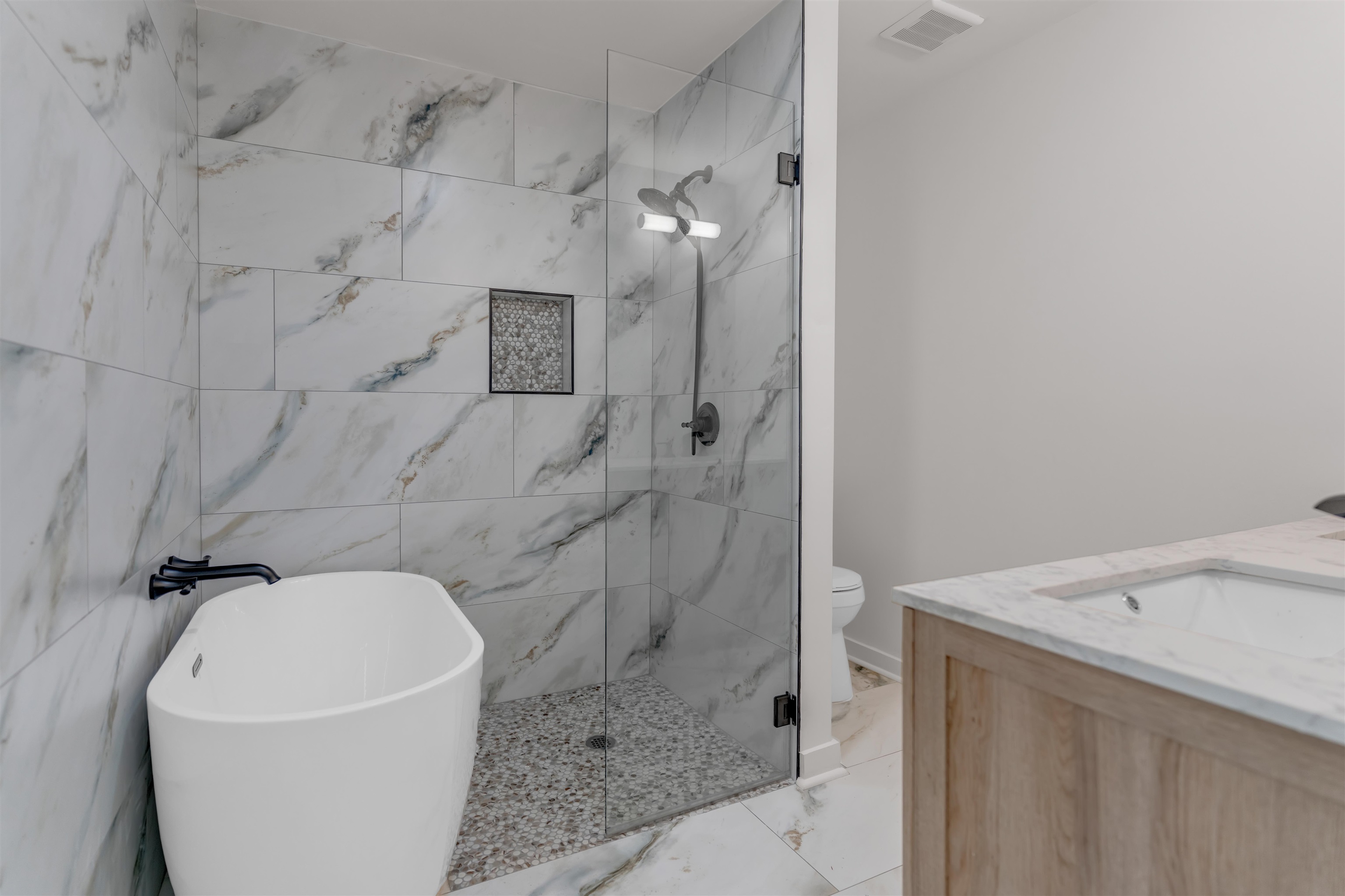 815 Fisherville Road Collierville, TN 38017 - Photo 15 of 40 a bathroom with a sink a toilet and shower