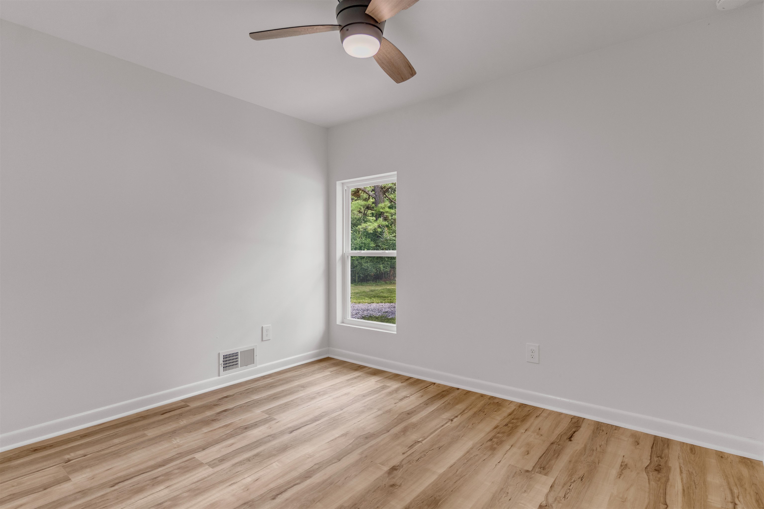 815 Fisherville Road Collierville, TN 38017 - Photo 22 of 40 wooden floor in an empty room with a window