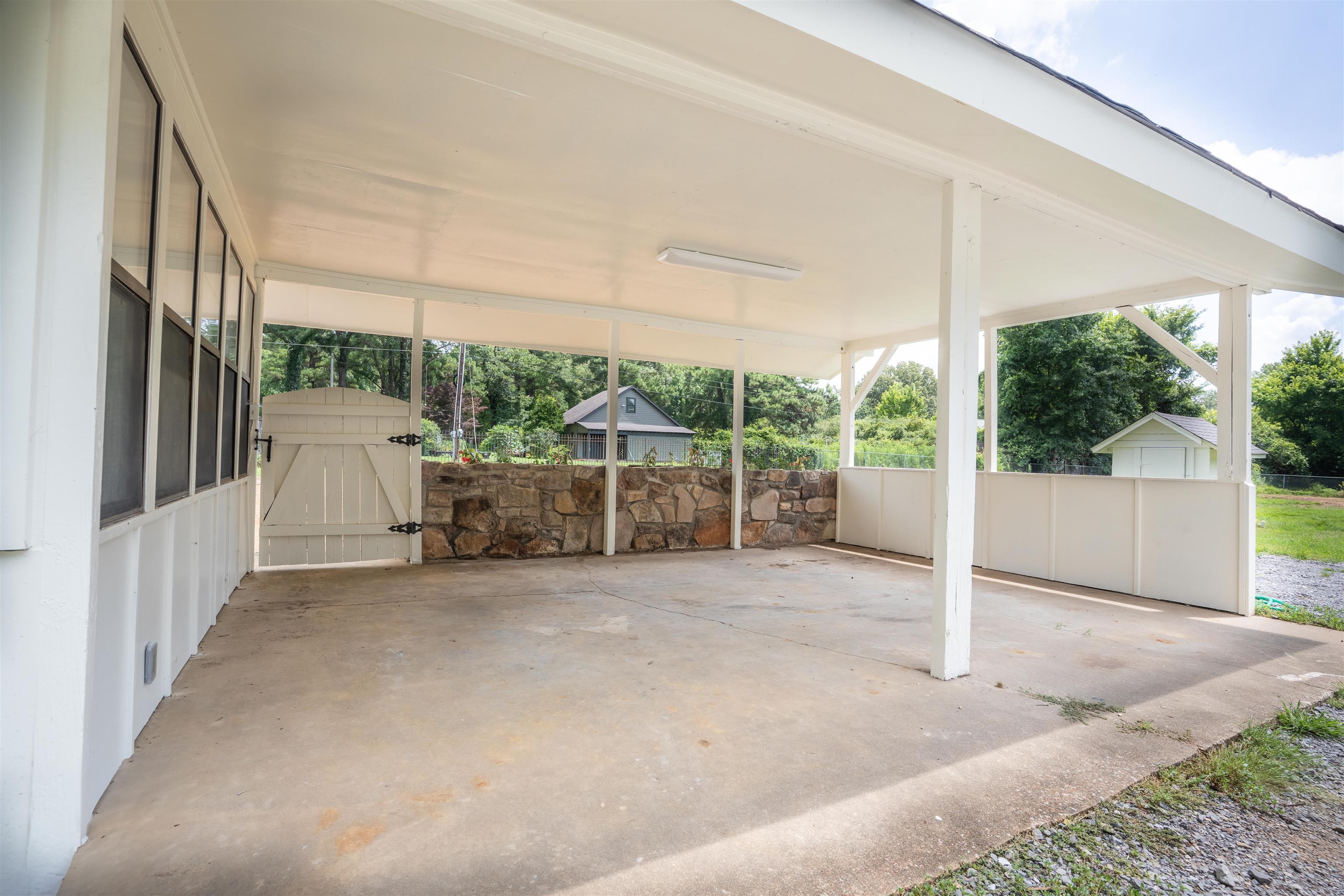 815 Fisherville Road Collierville, TN 38017 - Photo 32 of 40 a view of a house with porch and garden
