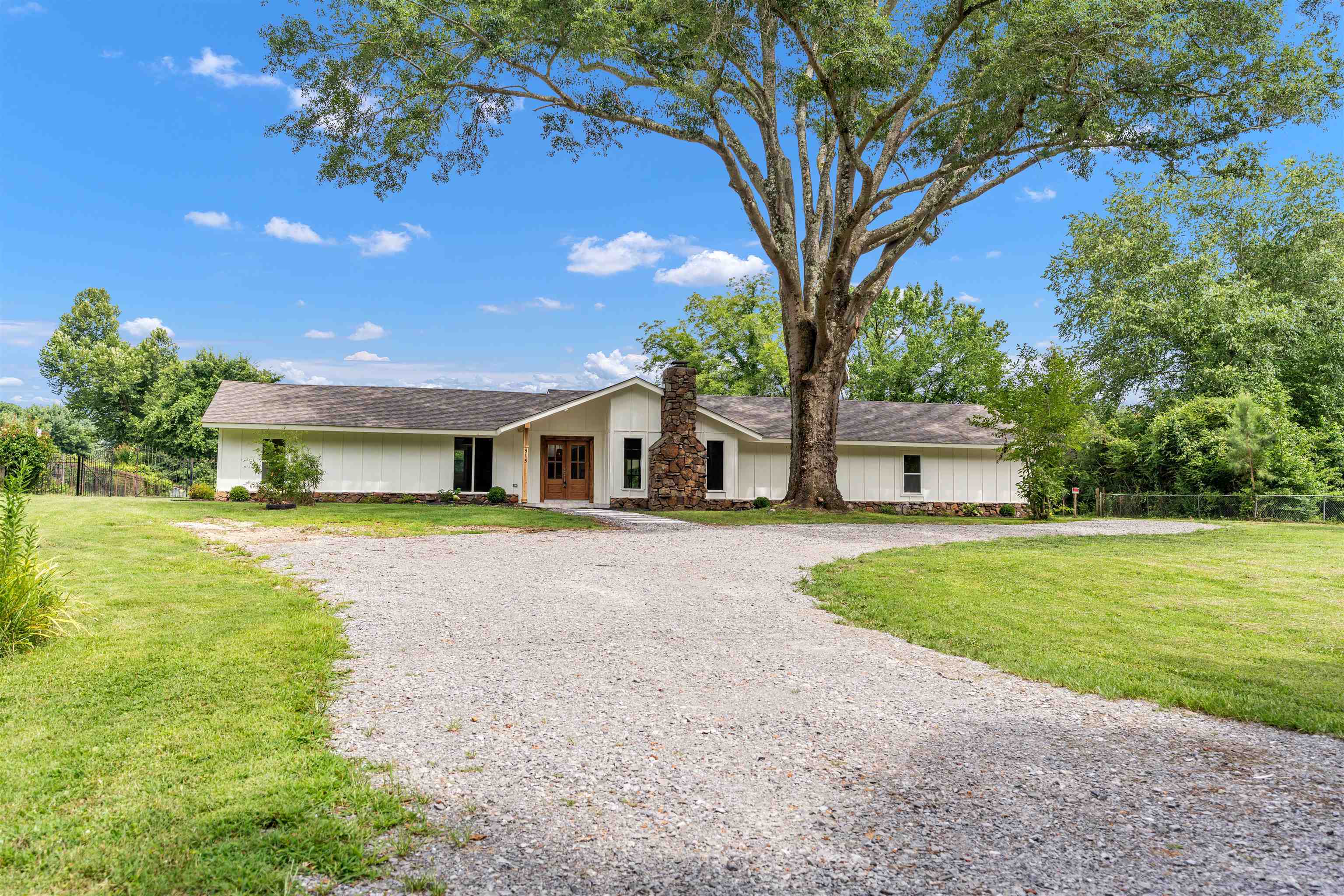 815 Fisherville Road Collierville, TN 38017 - Photo 37 of 40 a front view of a house with a yard and garage