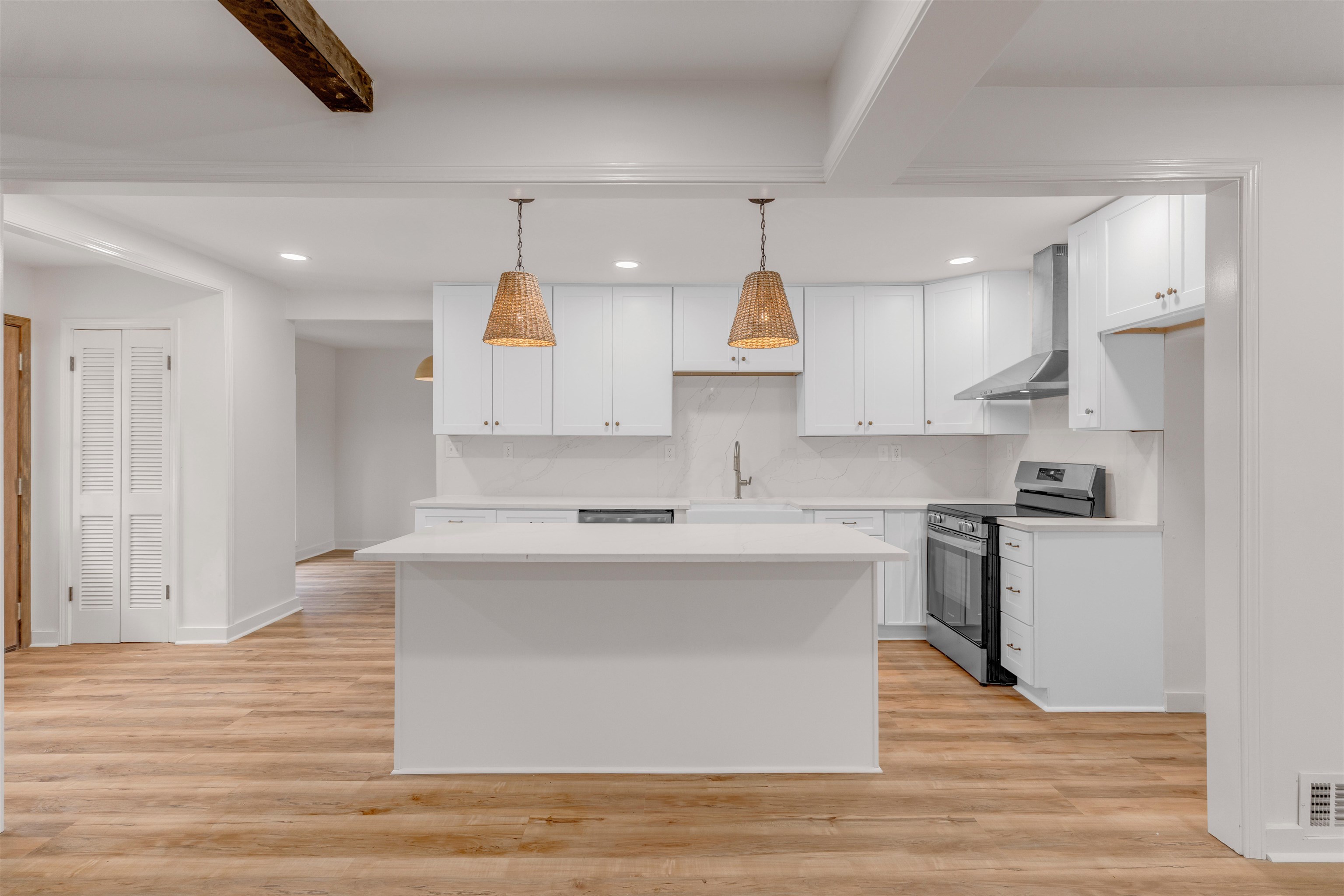 815 Fisherville Road Collierville, TN 38017 - Photo 6 of 40 a kitchen with kitchen island a sink stainless steel appliances and cabinets