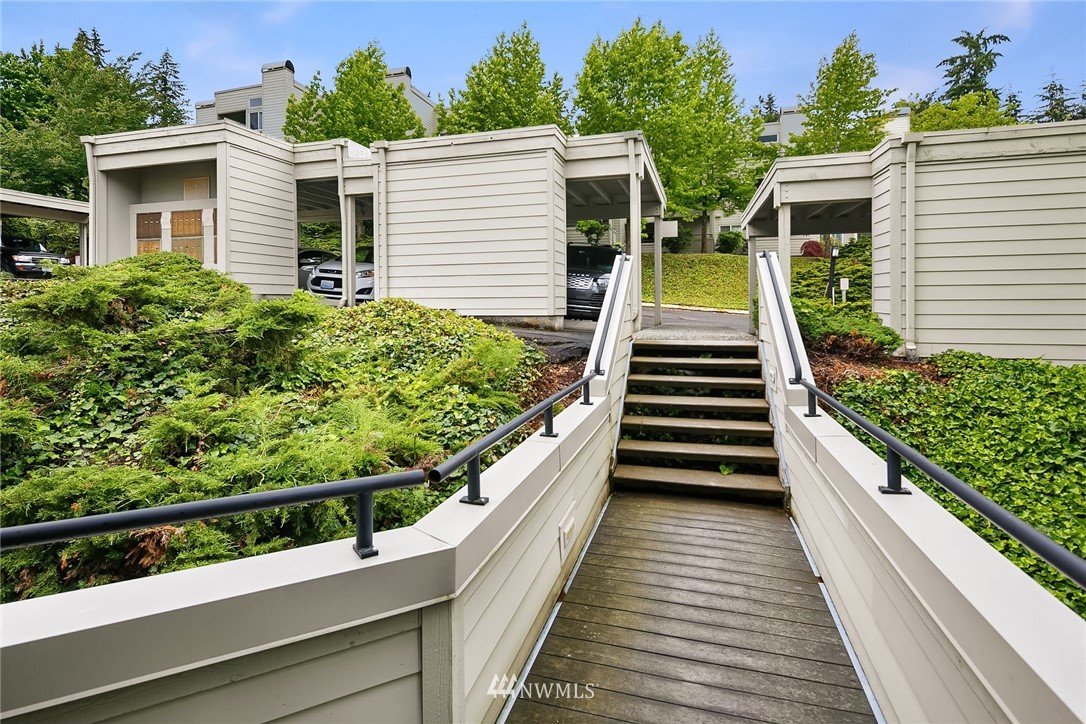7407 Old Redmond Road, Unit 207 Redmond, WA 98052 - Photo 2 of 23 a view of a balcony with two chairs