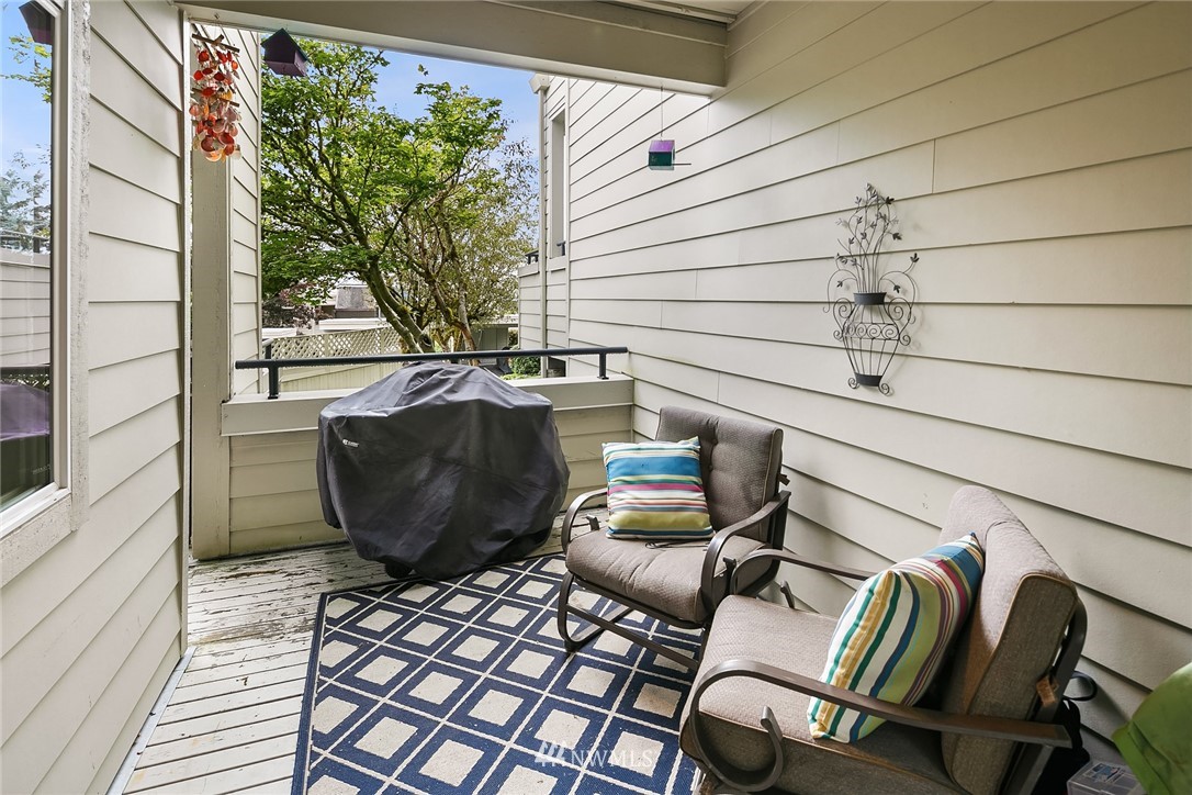 7407 Old Redmond Road, Unit 207 Redmond, WA 98052 - Photo 11 of 23 a view of a chairs and table in the balcony