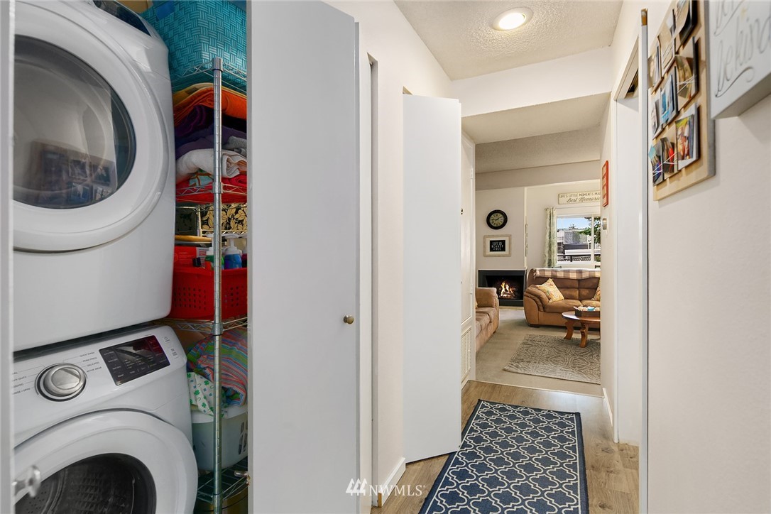 7407 Old Redmond Road, Unit 207 Redmond, WA 98052 - Photo 13 of 23 a utility room with dryer and washer