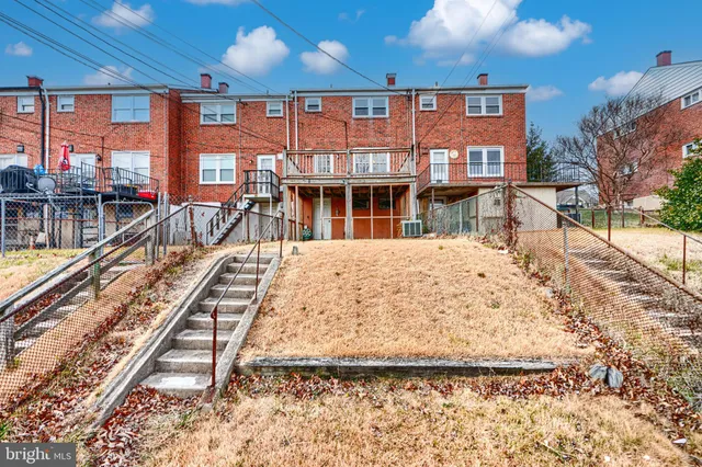 a view of swimming pool with outdoor seating