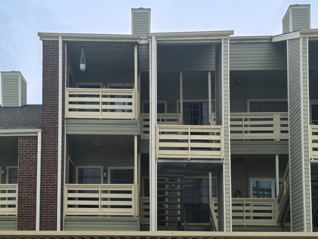 500 Ferry Road, Unit 323C Galveston, TX 77550 - Photo 17 of 17 a view of a house with a door and a window