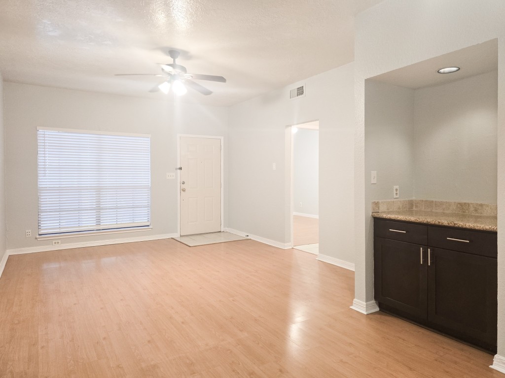 500 Ferry Road, Unit 323C Galveston, TX 77550 - Photo 5 of 17 a view of an empty room with a window