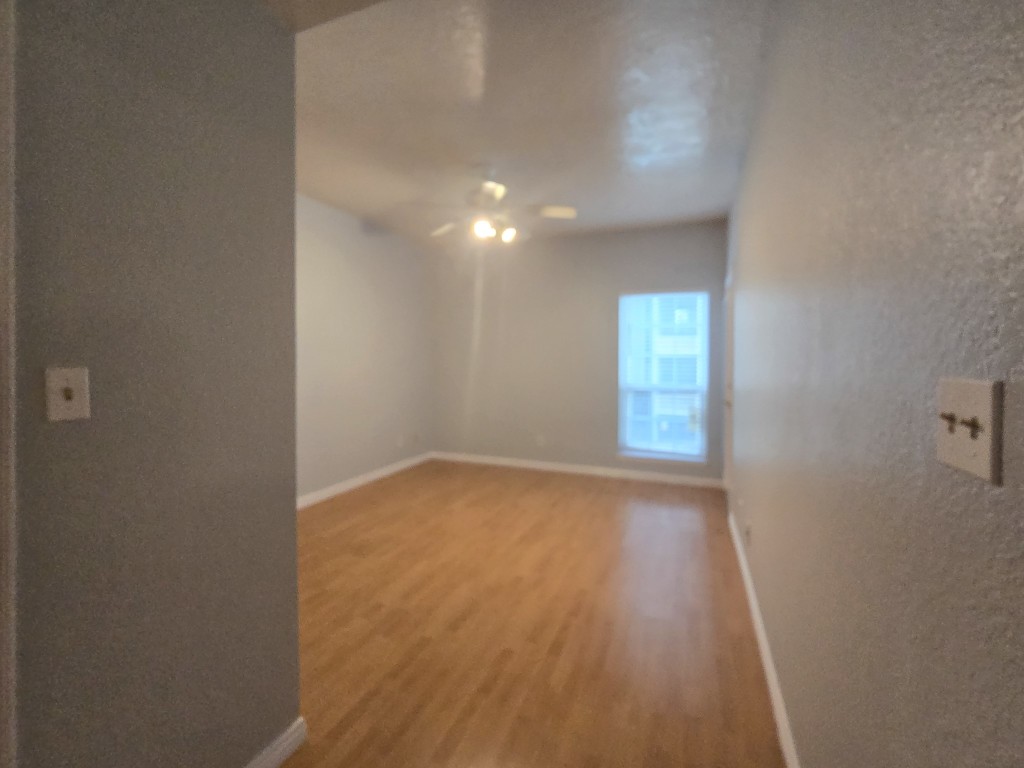 500 Ferry Road, Unit 323C Galveston, TX 77550 - Photo 10 of 17 a view of empty room with window