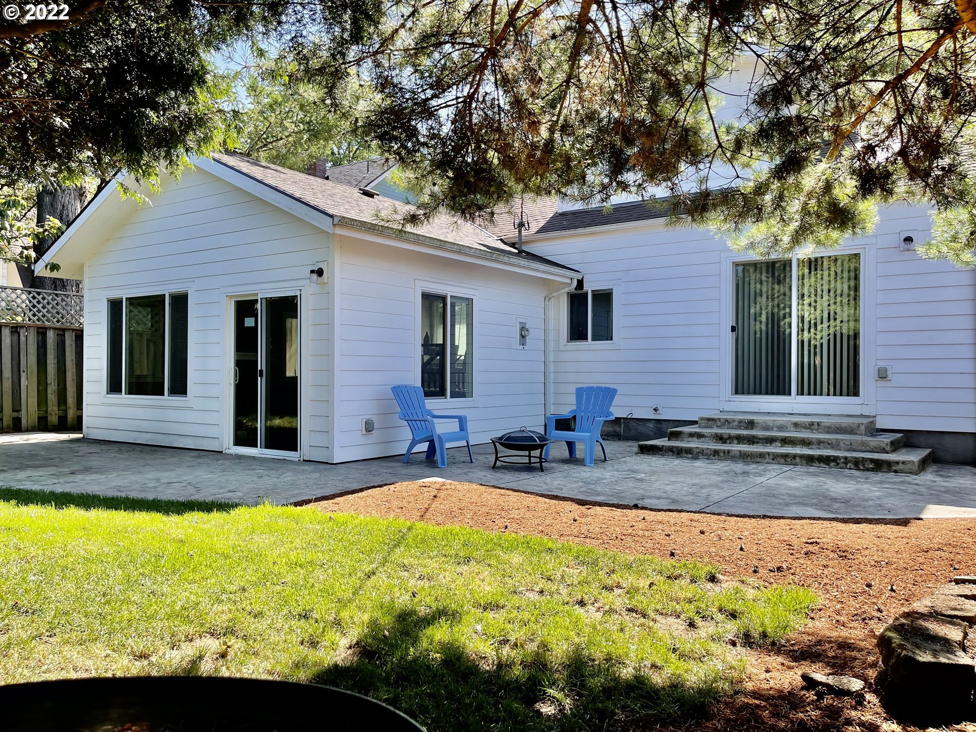 7136 North Chase Avenue Portland, OR 97217 - Photo 25 of 26 a view of a house with swimming pool and sitting area