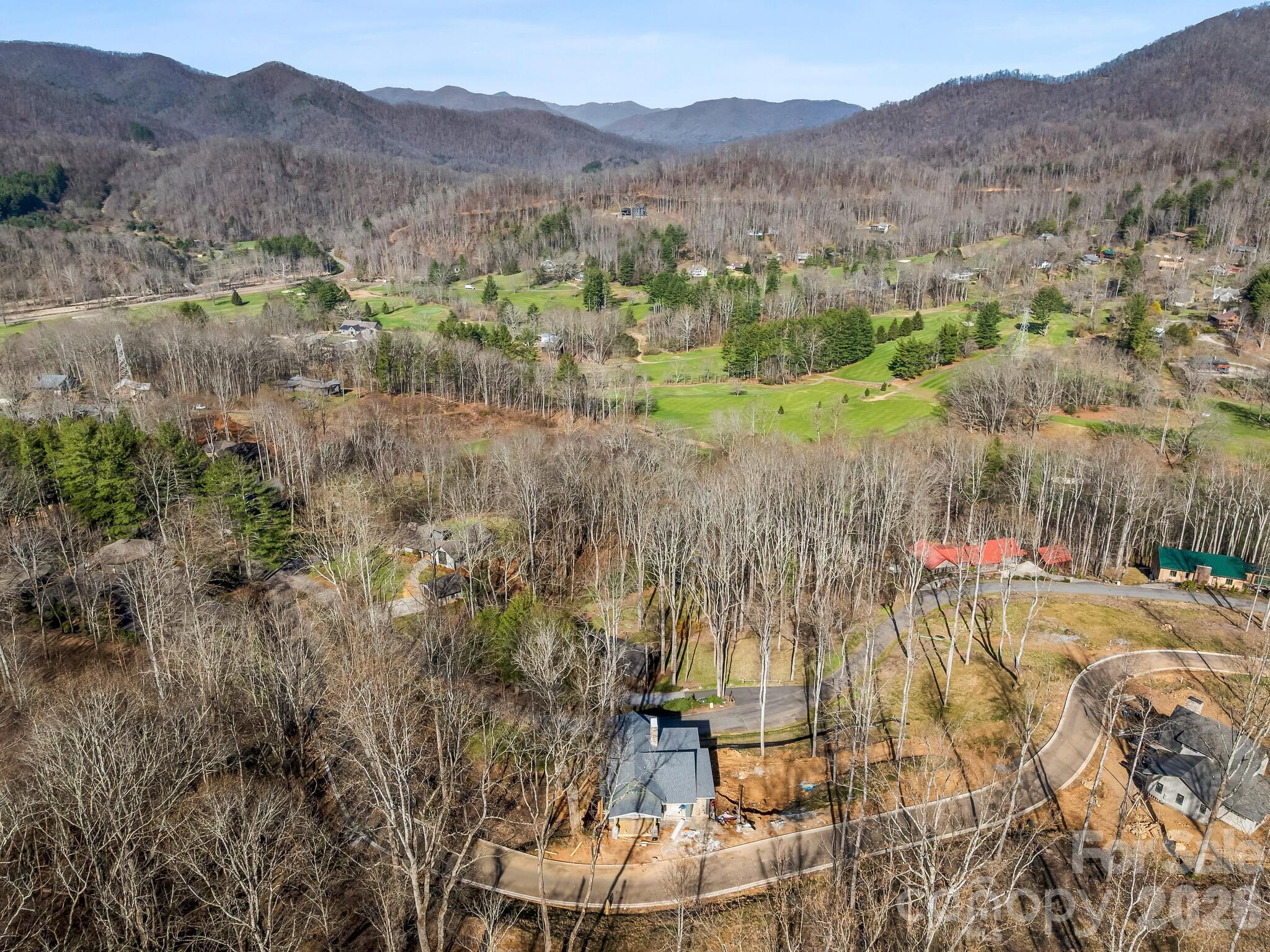 51 Bear Tree Cove Canton, NC 28716 - Photo 17 of 17 a view of a town with mountains in the background