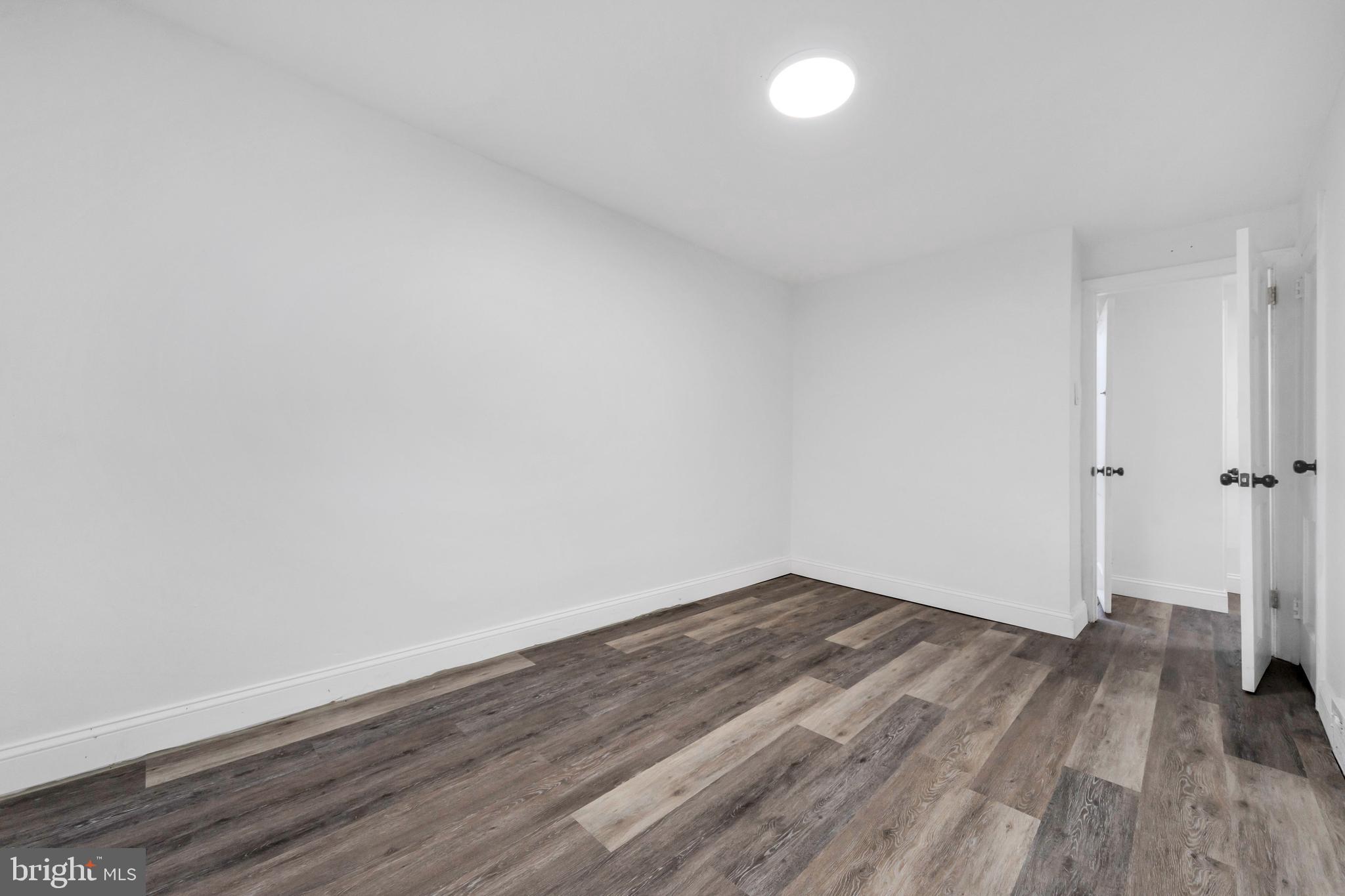 312 Golf Road Darby, PA 19023 - Photo 19 of 27 a view of a room with wooden floor