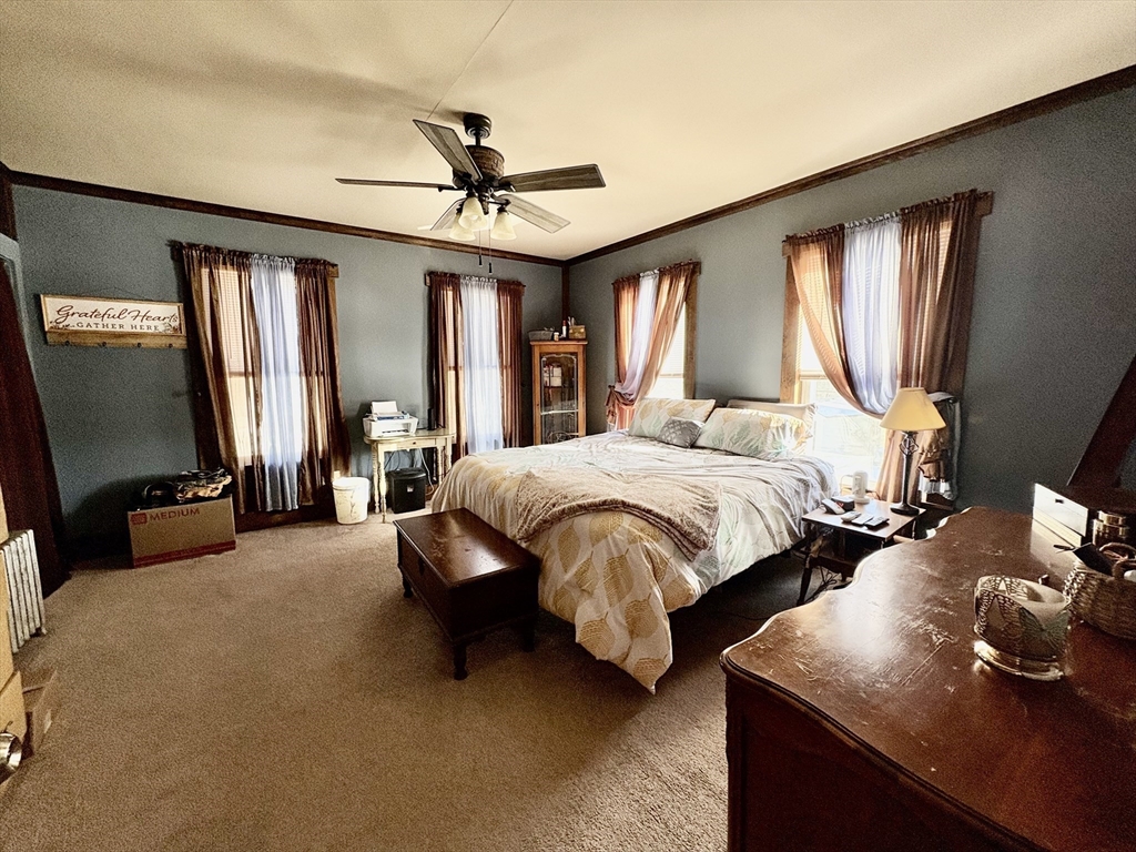 111 Quaboag Street Warren, MA 01083 - Photo 24 of 38 a bedroom with bed and window