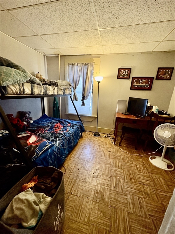 111 Quaboag Street Warren, MA 01083 - Photo 32 of 38 a bedroom with a bed and a table