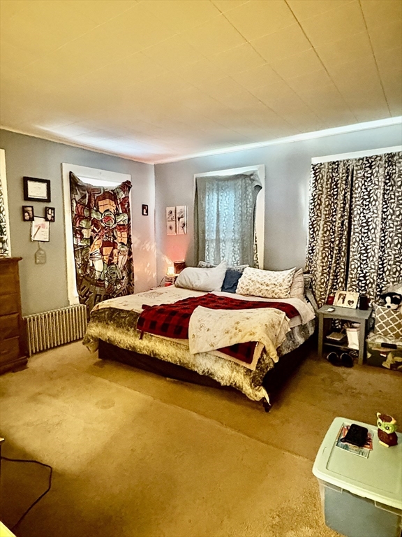 111 Quaboag Street Warren, MA 01083 - Photo 33 of 38 a bedroom with a bed and a couch