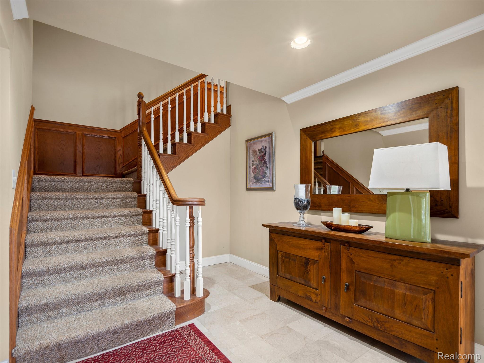 5724 Murfield Drive Rochester, MI 48306 - Photo 57 of 99 Staircase with ornamental molding and recessed lighting