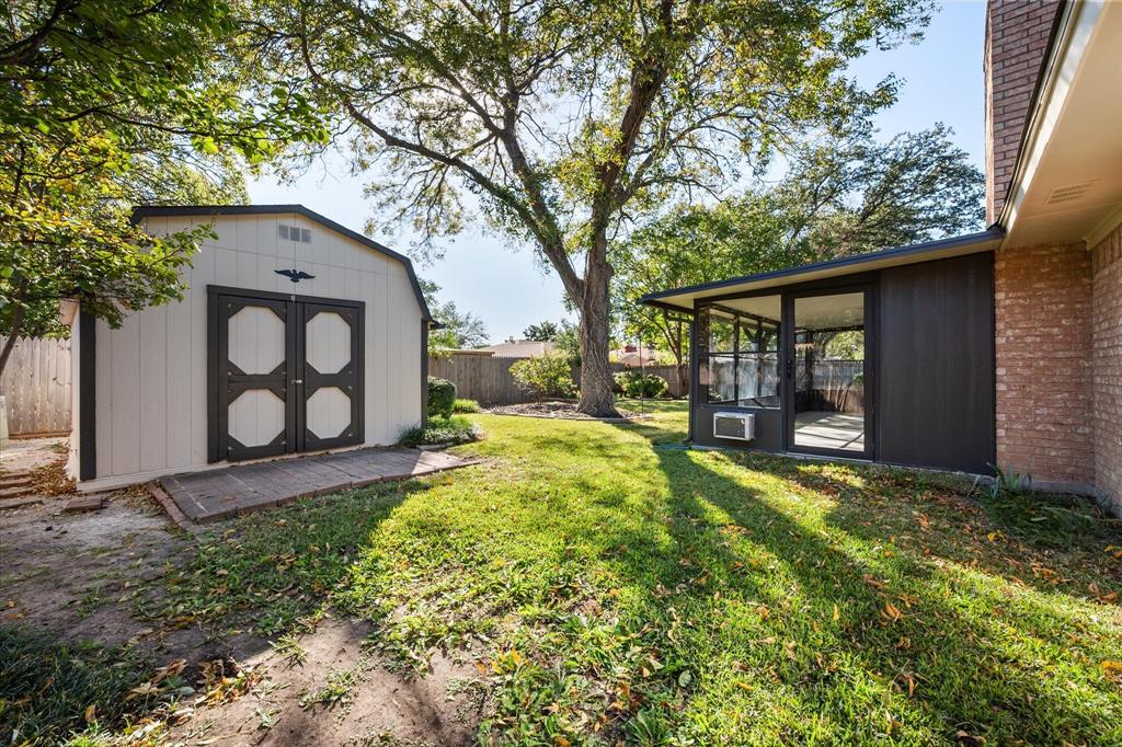 2008 Chalice Road Arlington, TX 76014 - Photo 24 of 28 a view of a house with backyard and sitting area