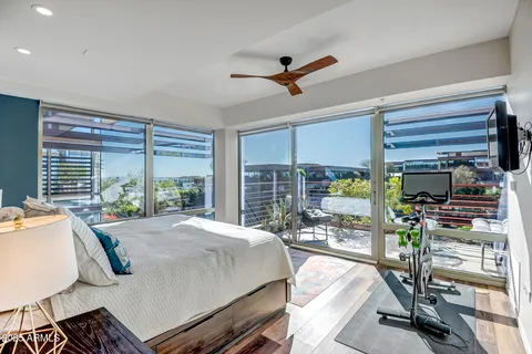 a bed room with a bed and a desk