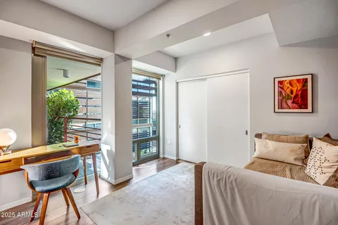 a room with filled with furniture and window