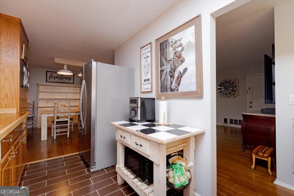 150 Moss Oaks Road Perry, GA 31069 - Photo 20 of 51 a view of kitchen with stainless steel appliances granite countertop a stove and a refrigerator