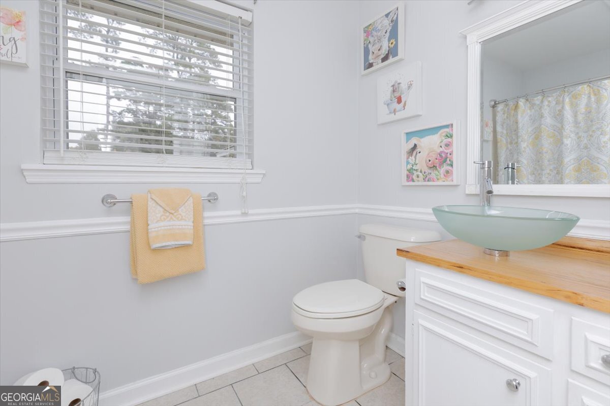 150 Moss Oaks Road Perry, GA 31069 - Photo 36 of 51 a bathroom with a sink and a toilet