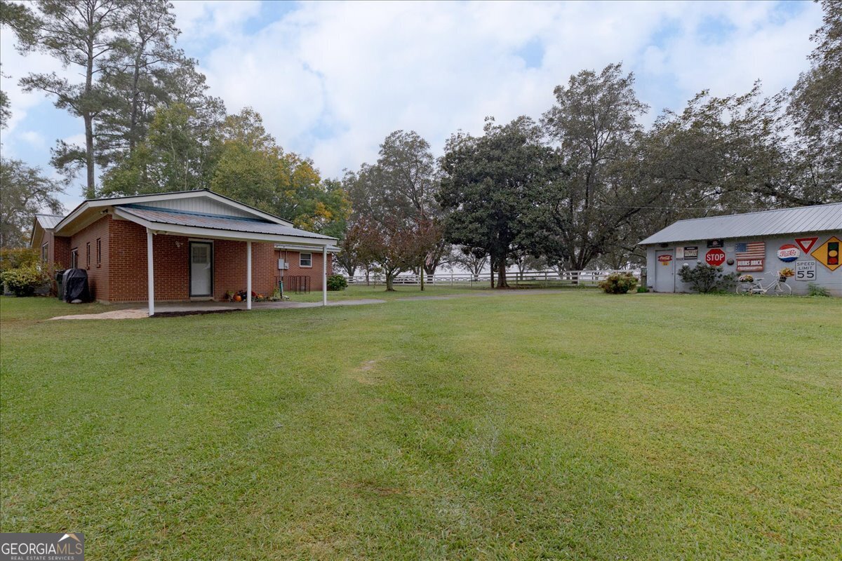 150 Moss Oaks Road Perry, GA 31069 - Photo 43 of 51 a view of a house with a yard