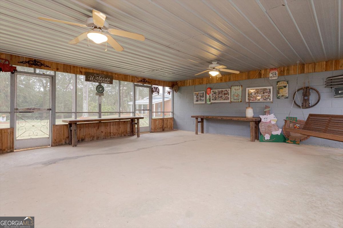 150 Moss Oaks Road Perry, GA 31069 - Photo 50 of 51 a big room with chandelier
