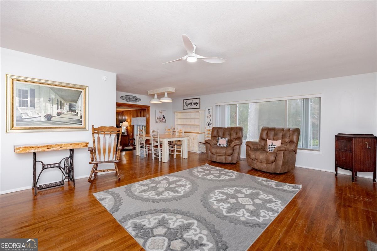 150 Moss Oaks Road Perry, GA 31069 - Photo 7 of 51 a living room with furniture rug and wooden floor