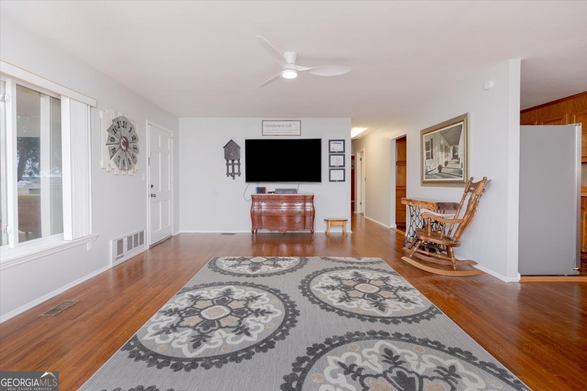 150 Moss Oaks Road Perry, GA 31069 - Photo 9 of 51 a bedroom with a bed and a flat screen tv