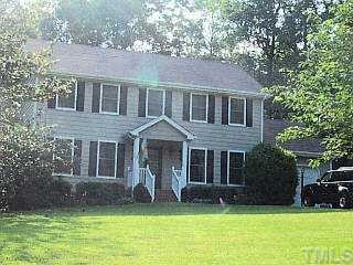 8124 North Creek Run Raleigh, NC 27613 - Photo 1 of 1 a front view of a house with a yard