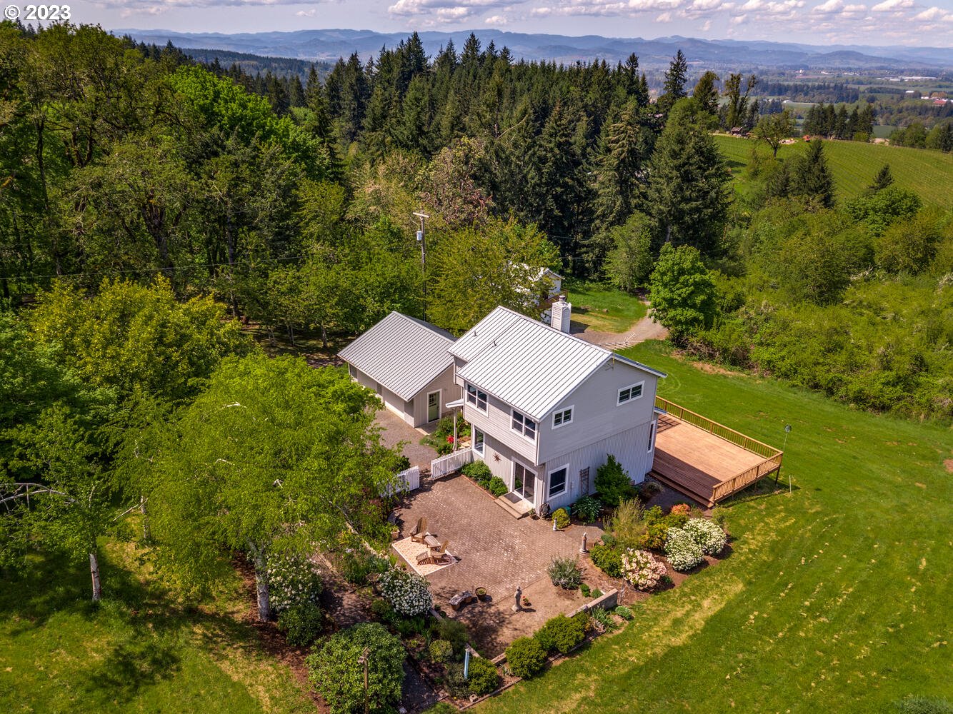 16845 Southeast Walnut Hill Road Amity, OR 97101 - Photo 1 of 48 an aerial view of a house with a yard
