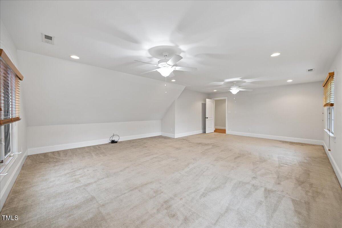 2507 Mayview Road Raleigh, NC 27607 - Photo 44 of 53 Huge bonus over the garage. Only carpeted area.