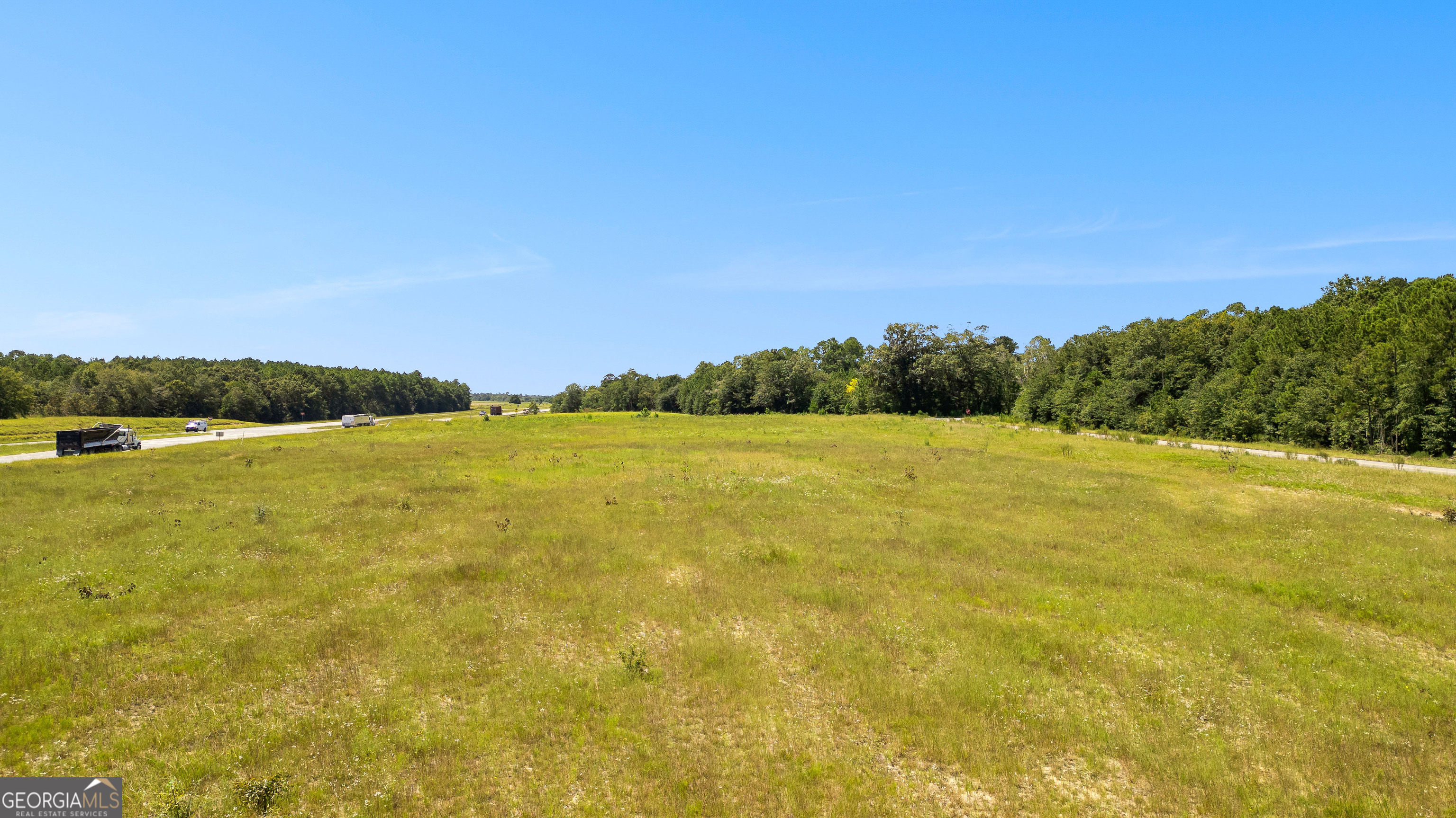 a view of yard with ocean view