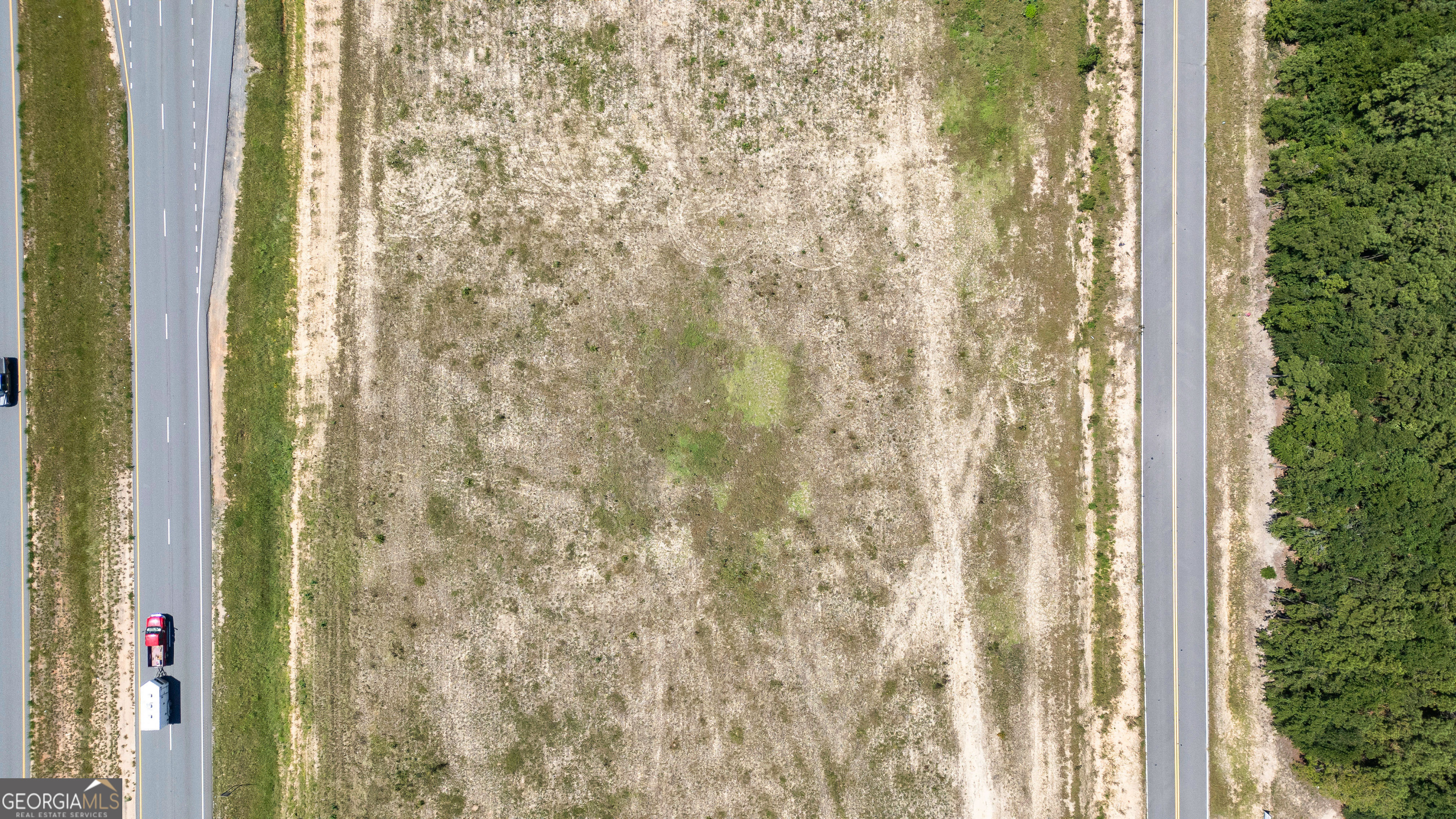 0 West Fall Line Freeway Butler, GA 31006 - Photo 14 of 18 a bathroom with a shower curtain