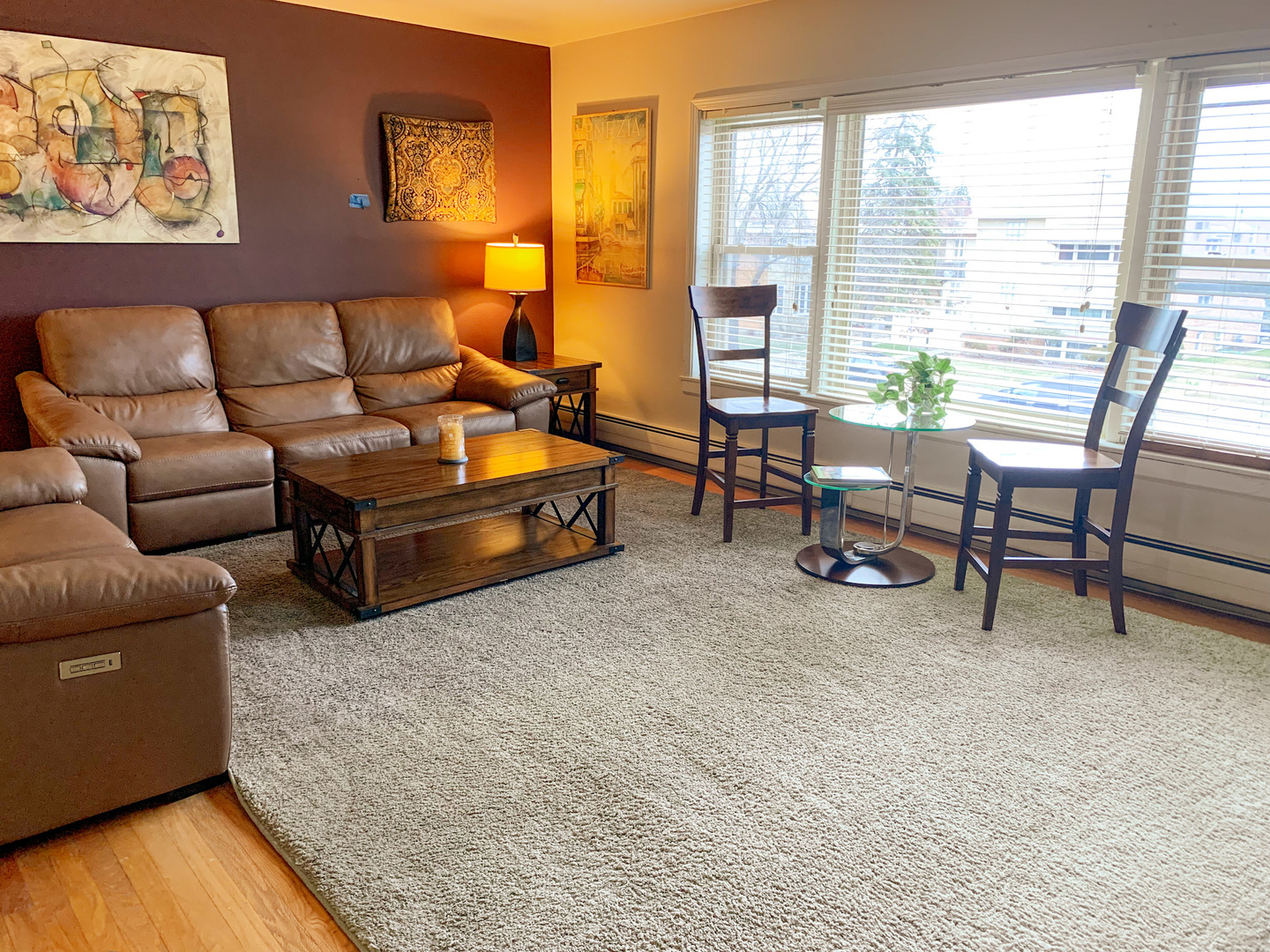1616 South Mannheim Road Westchester, IL 60154 - Photo 4 of 13 a living room with furniture and a large window