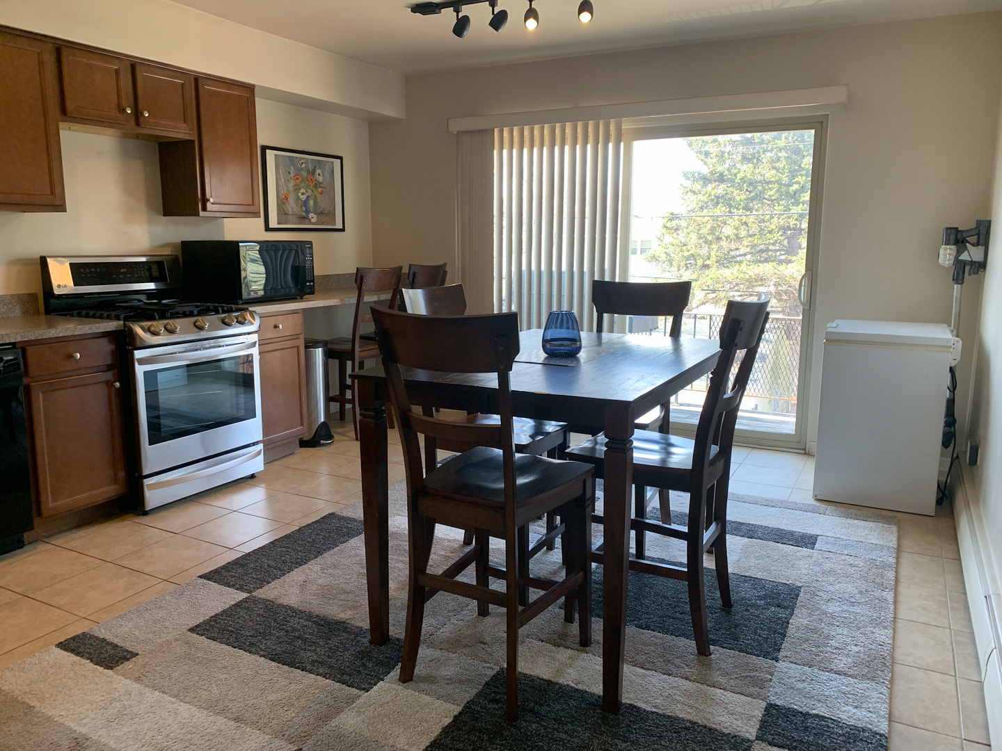 1616 South Mannheim Road Westchester, IL 60154 - Photo 6 of 13 a view of a dining room with furniture and window