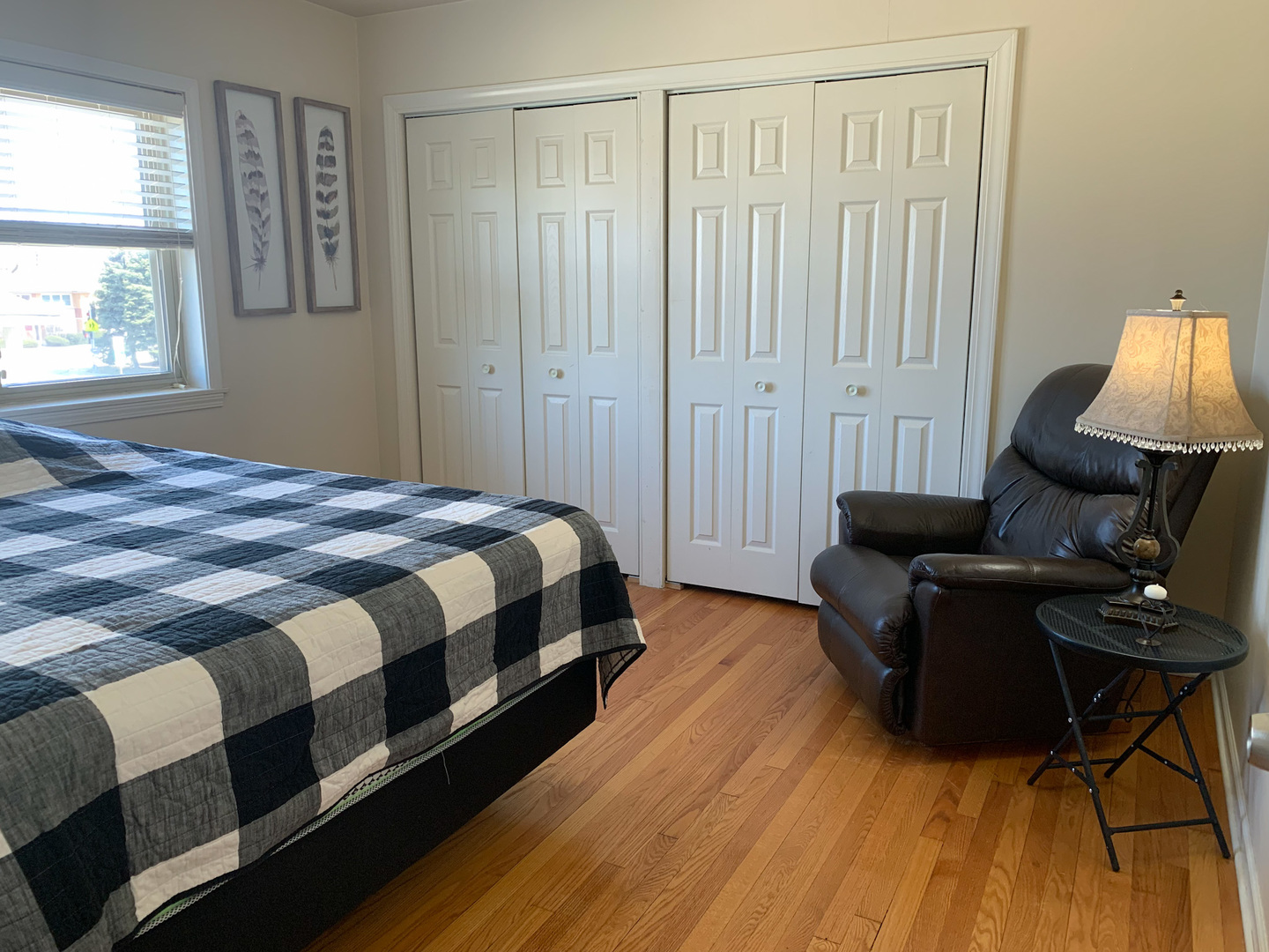 1616 South Mannheim Road Westchester, IL 60154 - Photo 7 of 13 a spacious bedroom with a bed and a window
