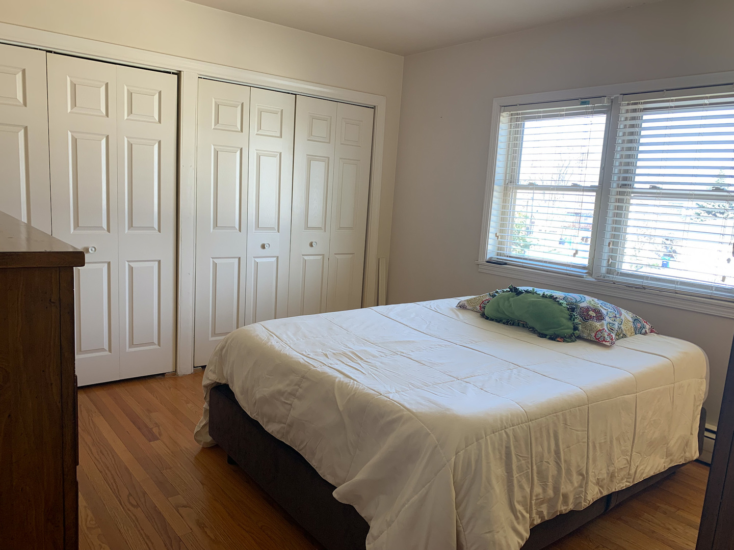 1616 South Mannheim Road Westchester, IL 60154 - Photo 8 of 13 a bedroom with a bed and a window