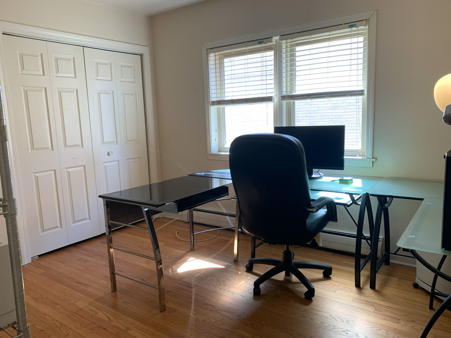1616 South Mannheim Road Westchester, IL 60154 - Photo 9 of 13 a view of a workspace with furniture and a window
