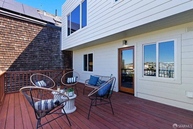 a backyard of a house with seating space