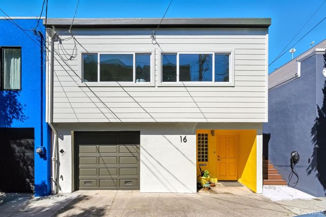 a view of a house with a balcony