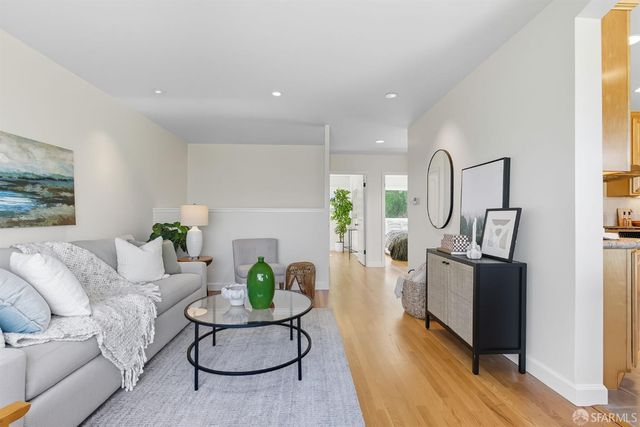 a living room with furniture and a couch