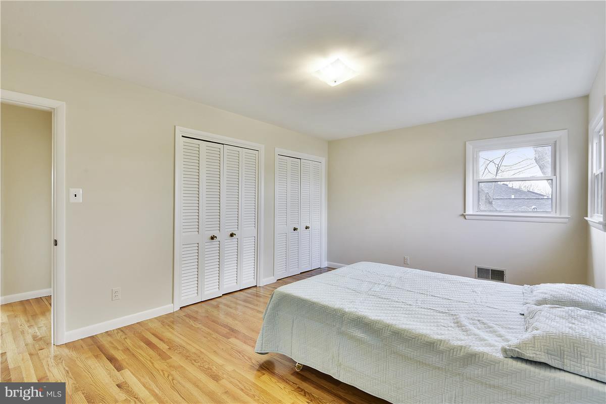 5901 Folkstone Road Bethesda, MD 20817 - Photo 12 of 30 a bedroom with a bed and a window
