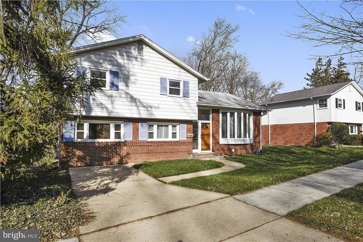 5901 Folkstone Road Bethesda, MD 20817 - Photo 3 of 30 a front view of a house with a yard