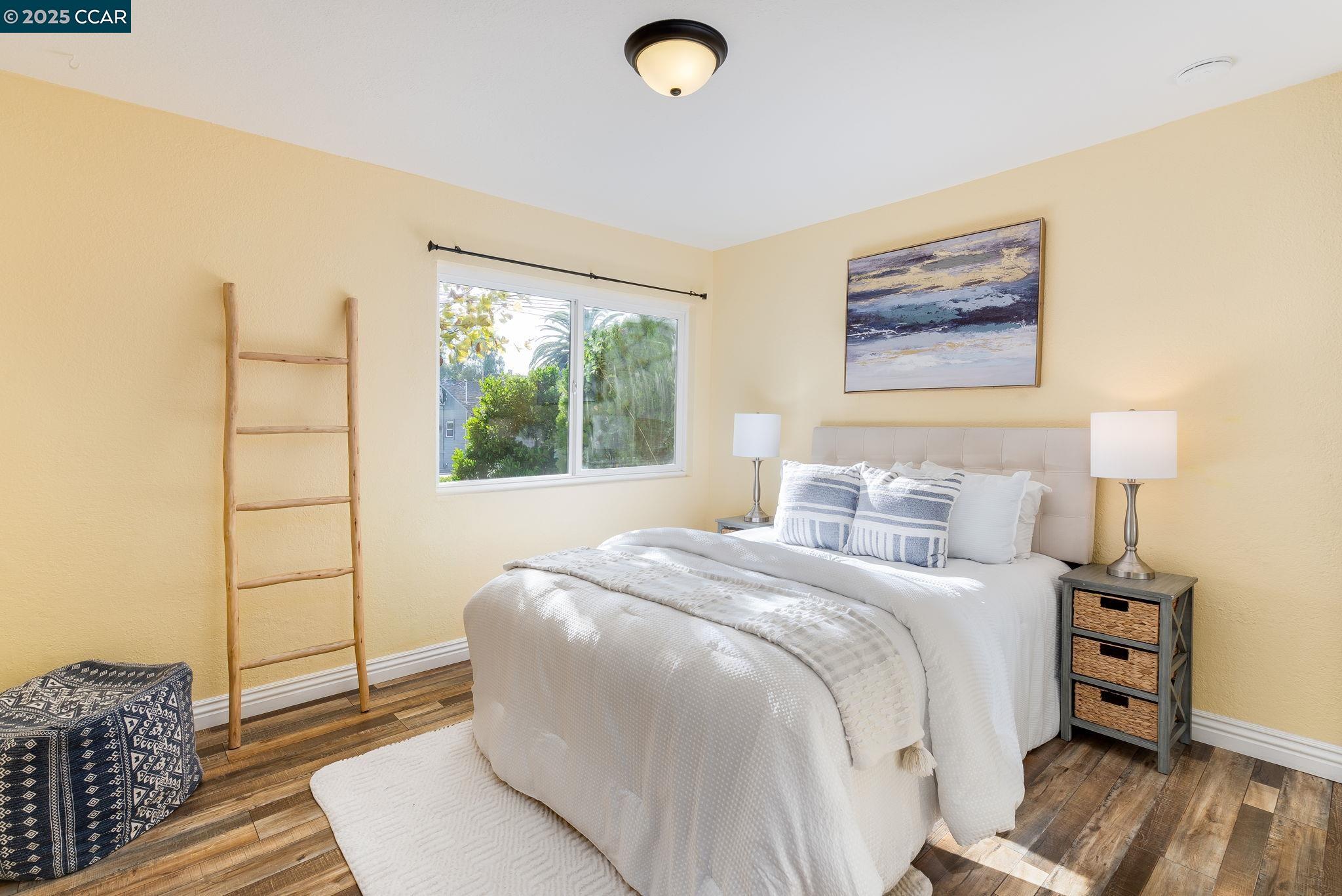 2941 Crawford Street Concord, CA 94518 - Photo 15 of 27 a bedroom with a bed and a window