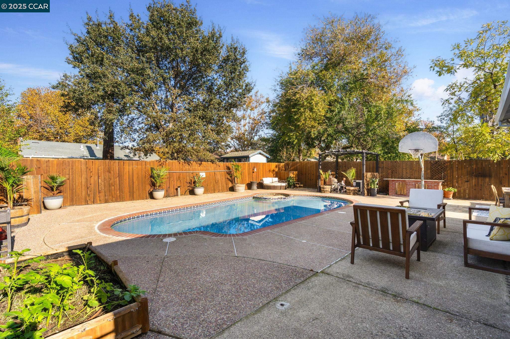 2941 Crawford Street Concord, CA 94518 - Photo 20 of 27 a view of a swimming pool with chairs