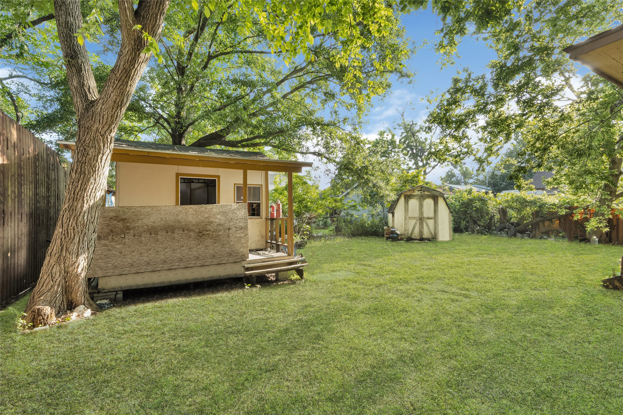 7305 Tremper Street Houston, TX 77020 - Photo 24 of 28 a view of a house with backyard and a tree