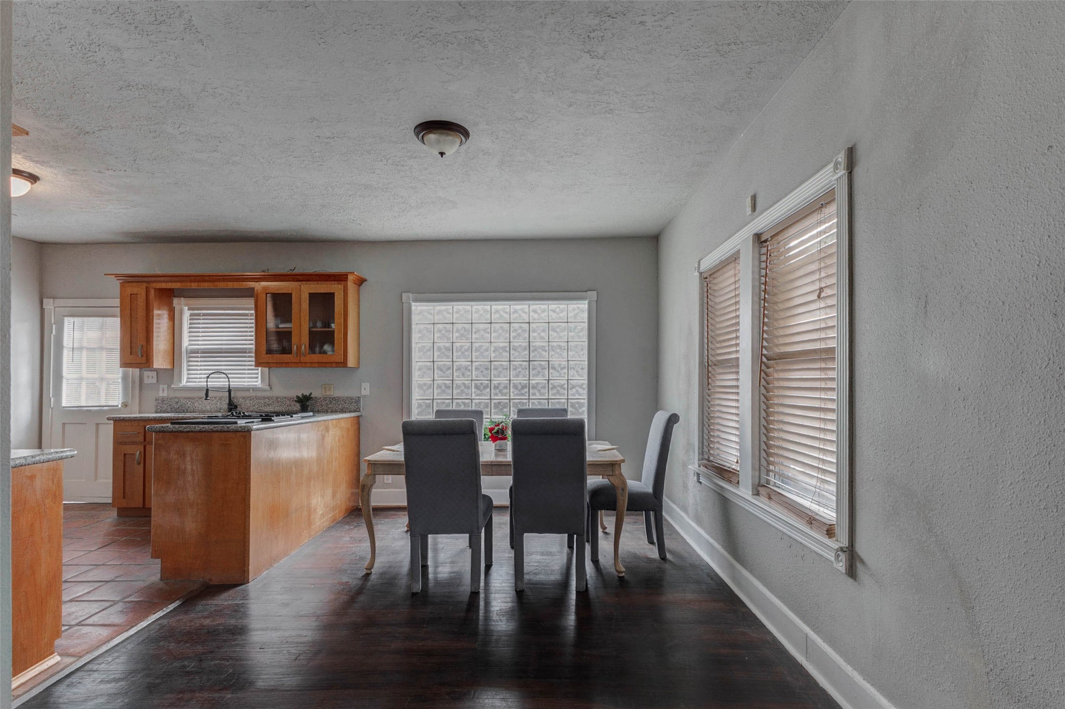 2410 Cleburne Street Houston, TX 77004 - Photo 20 of 27 a view of a dining room with furniture window and wooden floor