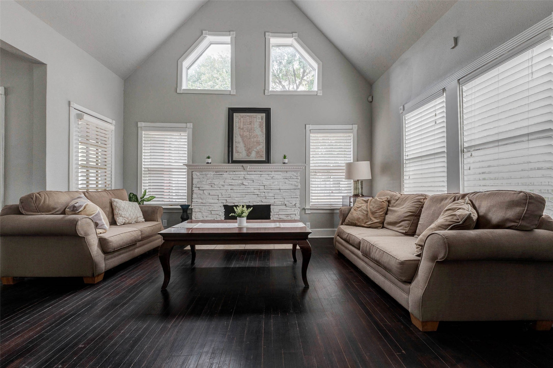 2410 Cleburne Street Houston, TX 77004 - Photo 24 of 27 a living room with furniture a large window and a fireplace