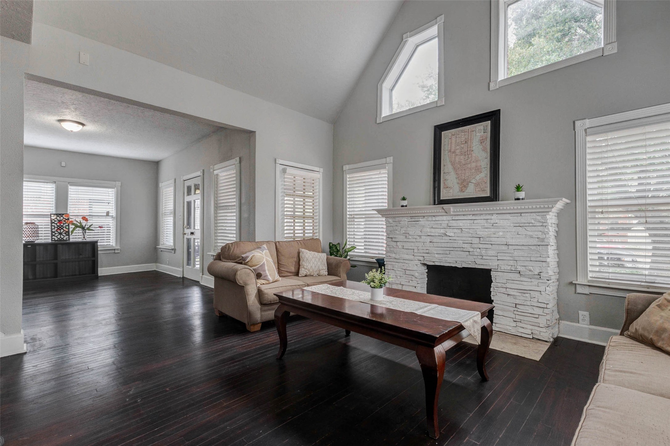 2410 Cleburne Street Houston, TX 77004 - Photo 25 of 27 a living room with furniture and a fireplace
